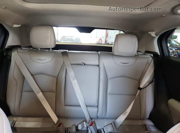 1GYFZDR40MF055834 2021 CADILLAC XT4 Burgundy Вид задніх сидінь