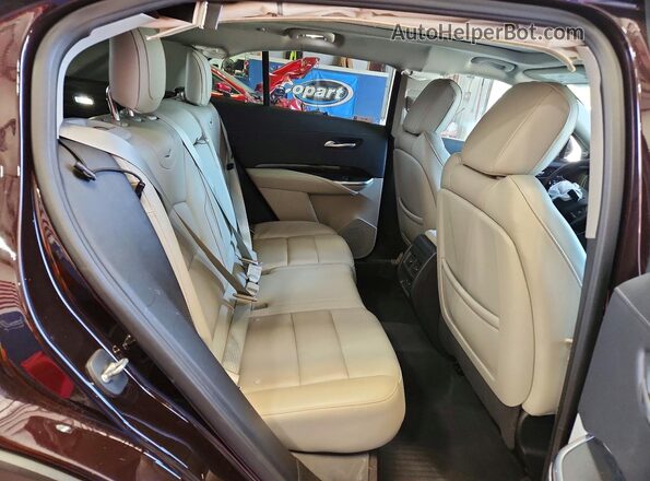 1GYFZDR40MF055834 2021 CADILLAC XT4 Burgundy Вид задньої частини салону