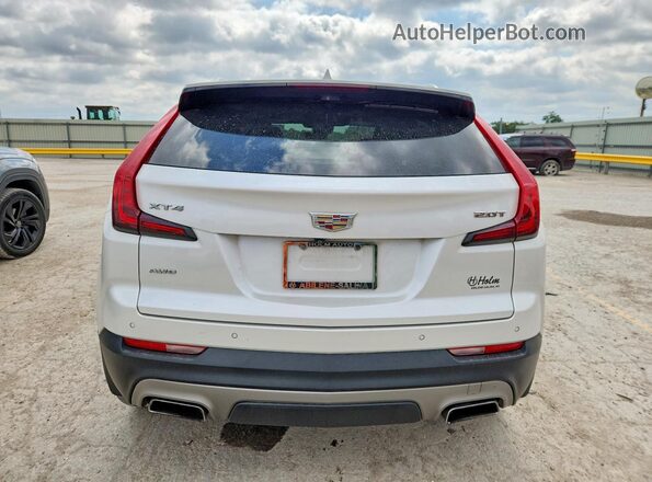 1GYFZDR42KF204581 2019 CADILLAC XT4 White Вид ззаду