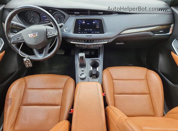 1GYFZDR42KF204581 2019 CADILLAC XT4 White Вид панелі приладів