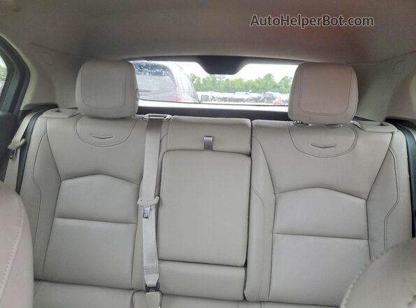 1GYFZDR42PF122406 2023 CADILLAC XT4 Silver უკანა სავარძლების ხედი