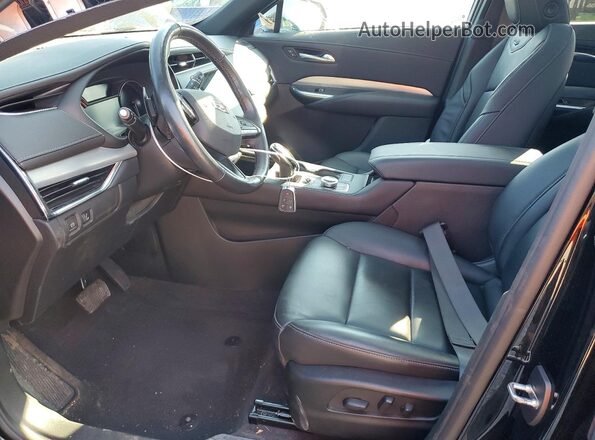 1GYFZDR42PF221520 2023 CADILLAC XT4 Black Vista interior delantera