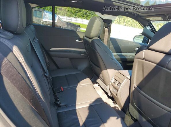 1GYFZDR42PF221520 2023 CADILLAC XT4 Black Vista interior trasera