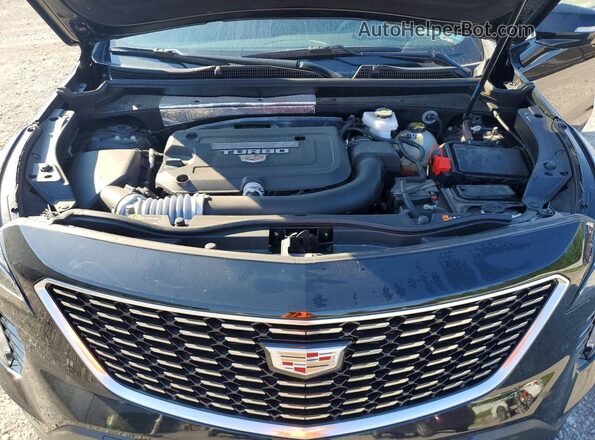 1GYFZDR42PF221520 2023 CADILLAC XT4 Black Vista del compartimento del motor