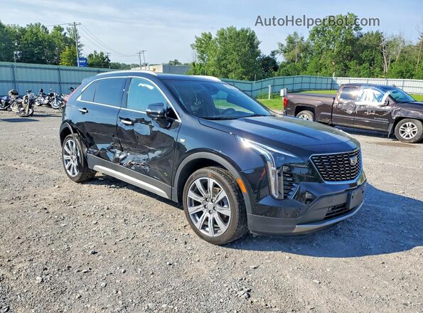 1GYFZDR42PF221520 2023 CADILLAC XT4 Black Delantero derecho