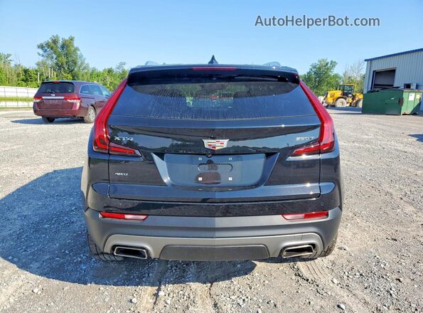 1GYFZDR42PF221520 2023 CADILLAC XT4 Black Vista trasera