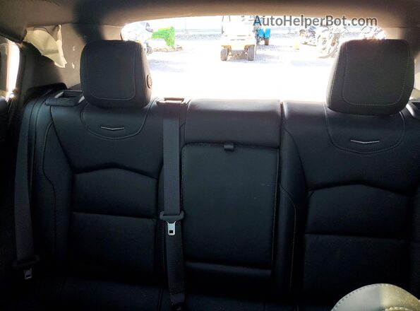 1GYFZDR42PF221520 2023 CADILLAC XT4 Black Vista de los asientos traseros
