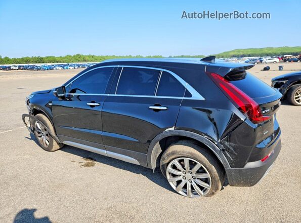 1GYFZDR45MF076601 2021 CADILLAC XT4 Black Trasero izquierdo