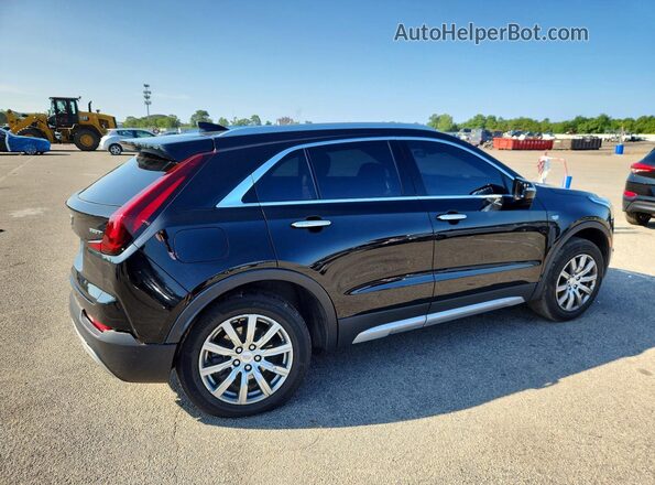 1GYFZDR45MF076601 2021 CADILLAC XT4 Black Trasero derecho