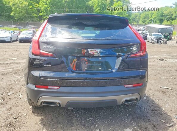 1GYFZDR46LF031889 2020 CADILLAC XT4 Black Вид ззаду