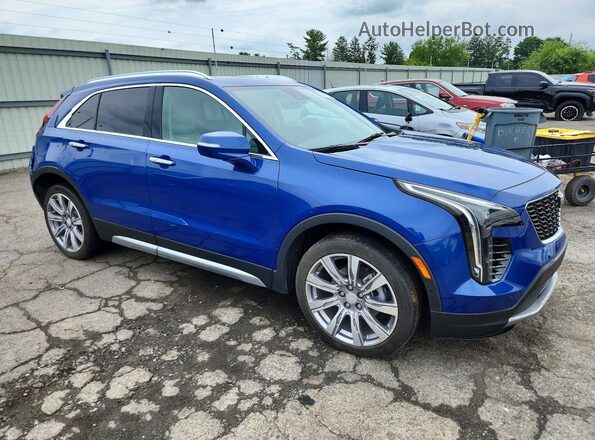1GYFZDR46MF000028 2021 CADILLAC XT4 Синий Передняя правая четверть