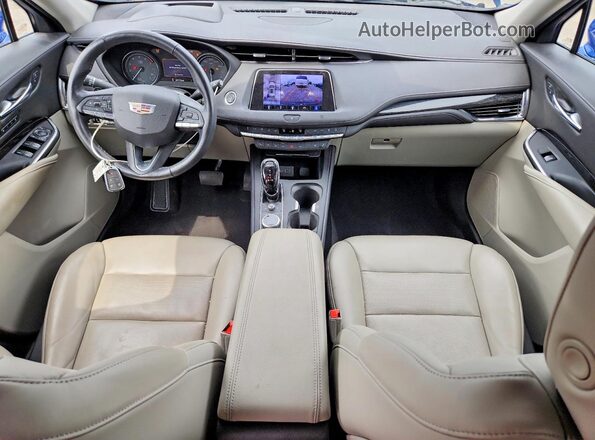 1GYFZDR46MF000028 2021 CADILLAC XT4 Синий Вид панели приборов