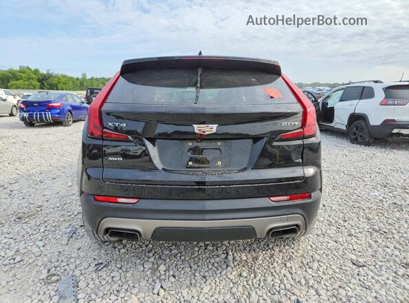 1GYFZDR47KF101687 2019 CADILLAC XT4 Black Հետևի տեսք