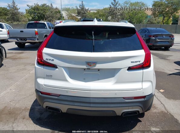 1GYFZDR47KF103858 2019 CADILLAC XT4 White 