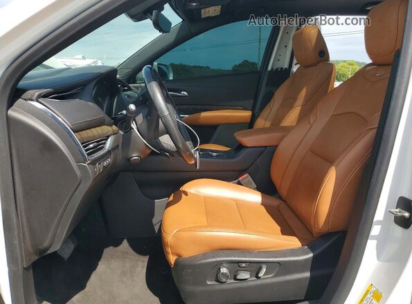 1GYFZDR48KF118059 2019 CADILLAC XT4 Белый Вид салона спереди