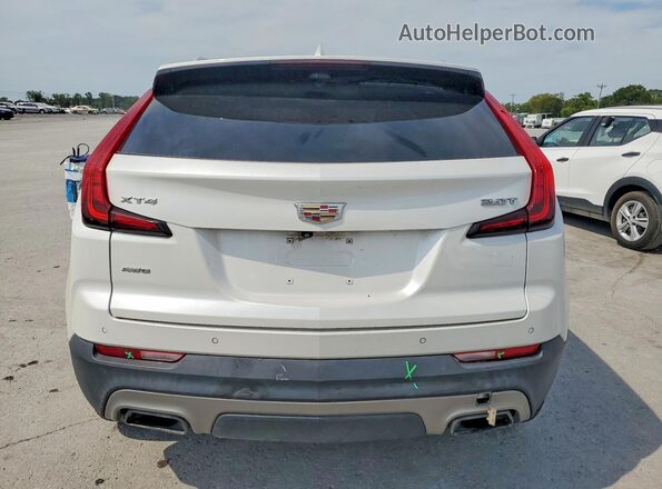 1GYFZDR48KF118059 2019 CADILLAC XT4 Белый Вид сзади