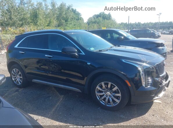 1GYFZDR49KF115784 2019 CADILLAC XT4 Черный Вид задней части салона