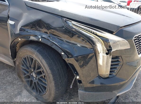 1GYFZDR49NF134646 2022 CADILLAC XT4 Black წინა ხედი