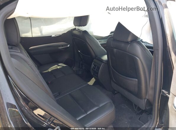 1GYFZDR49NF134646 2022 CADILLAC XT4 Black VIN კოდის სტიკერის ხედი
