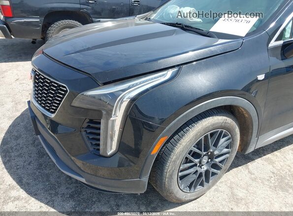 1GYFZDR49NF134646 2022 CADILLAC XT4 Black 