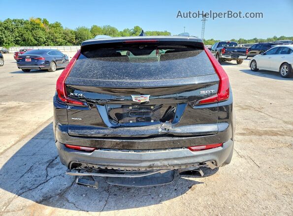 1GYFZDR4XKF117639 2019 CADILLAC XT4 Black Вид ззаду