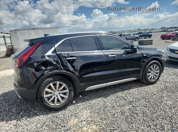 1GYFZDR4XMF077257 2021 CADILLAC XT4 Black უკანა მარჯვენა