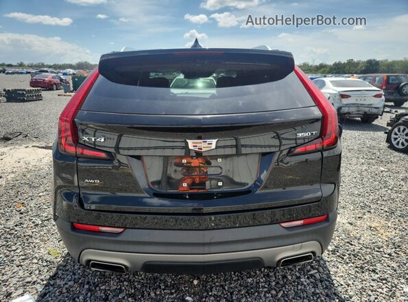 1GYFZDR4XMF077257 2021 CADILLAC XT4 Black უკანა ხედი