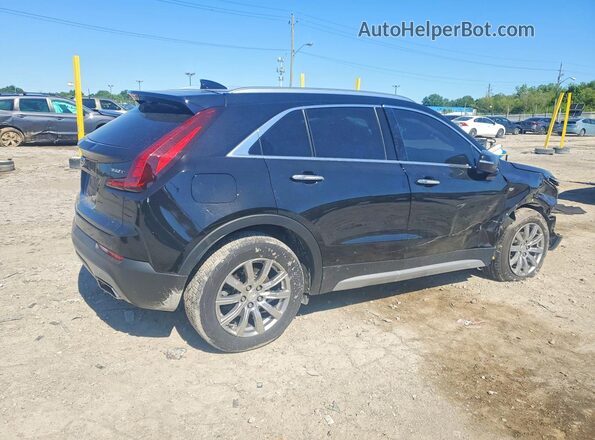 1GYFZDR4XPF101786 2023 CADILLAC XT4 Black Trasero derecho