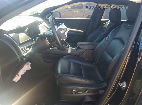 1GYFZDR4XPF101786 2023 CADILLAC XT4 Black Vista interior delantera