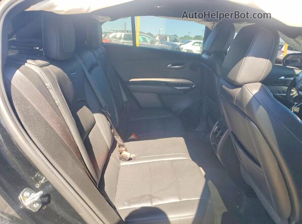 1GYFZDR4XPF101786 2023 CADILLAC XT4 Black Vista interior trasera