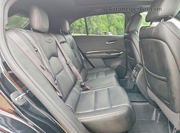 1GYFZER40LF053537 2020 CADILLAC XT4 Black Vista interior trasera