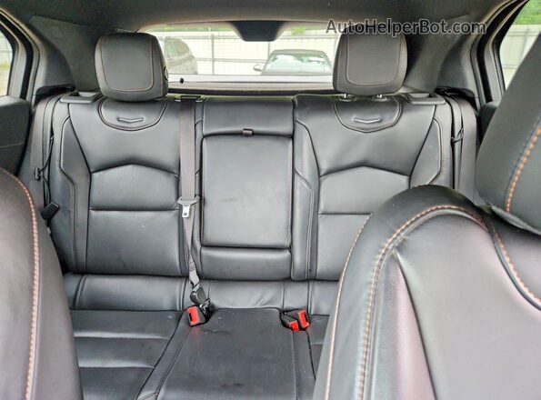1GYFZER40LF053537 2020 CADILLAC XT4 Black Vista de los asientos traseros
