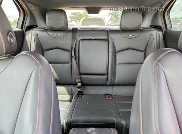 1GYFZER45KF229402 2019 CADILLAC XT4 Silver Հետևի նստատեղերի տեսք