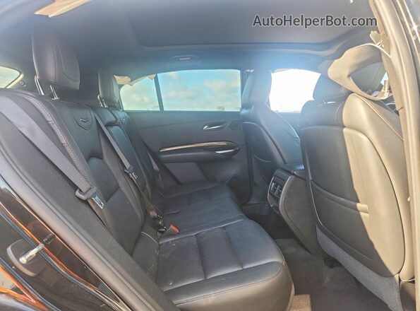 1GYFZER47PF108426 2023 CADILLAC XT4 Black Widok wnętrza z tyłu