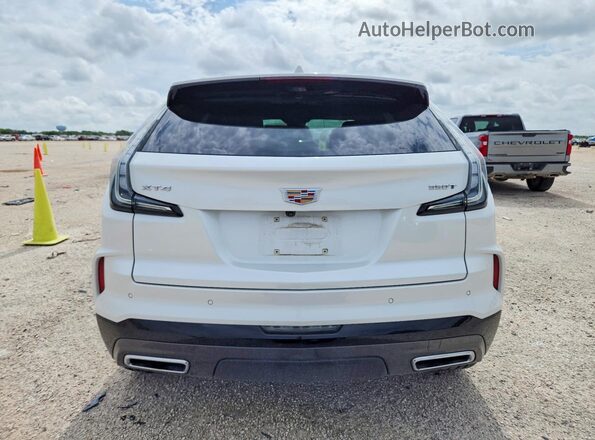 1GYFZER48RF243787 2024 CADILLAC XT4 White უკანა ხედი