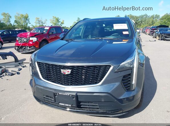 1GYFZER49KF172265 2019 CADILLAC XT4 Gray Вид задньої частини салону