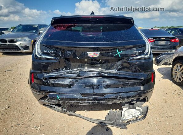 1GYFZER49RF242826 2024 CADILLAC XT4 Black Вид ззаду