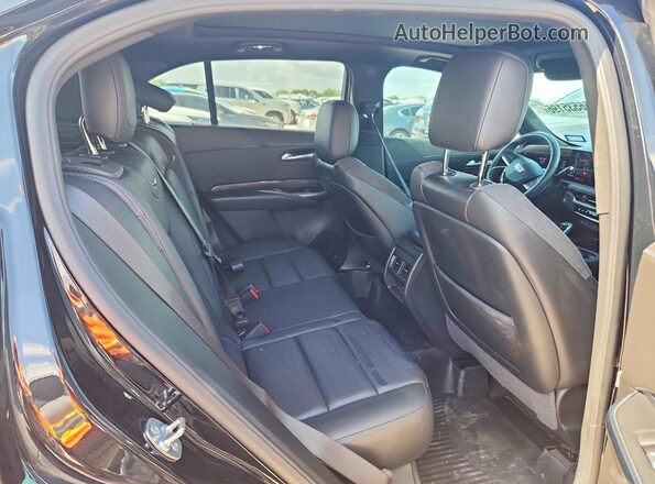 1GYFZER49RF242826 2024 CADILLAC XT4 Black Вид задньої частини салону