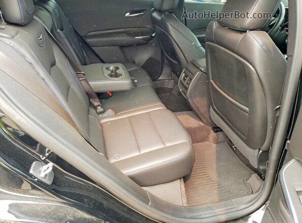 1GYFZFR43RF127015 2024 CADILLAC XT4 Black Rear interior view