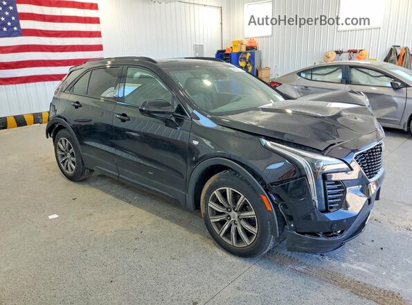 1GYFZFR47KF141084 2019 CADILLAC XT4 Black Front right