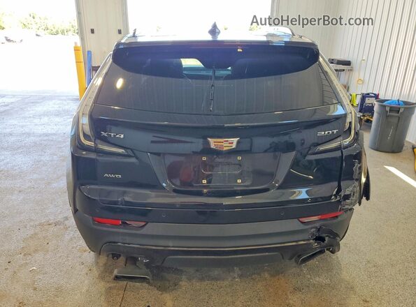 1GYFZFR47KF141084 2019 CADILLAC XT4 Black Rear view