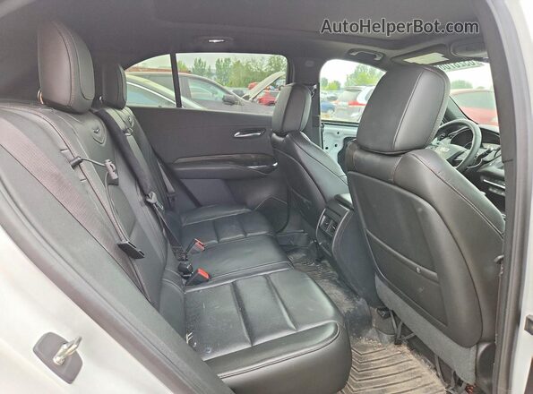 1GYFZFR49KF226850 2019 CADILLAC XT4 White Vista interior trasera