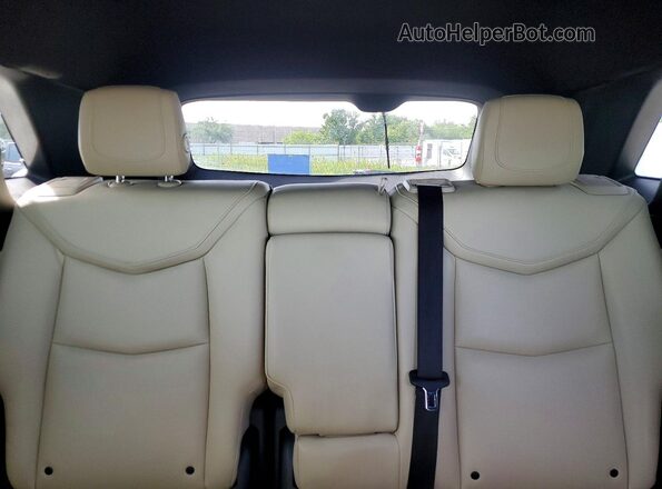 1GYKNARS0HZ322269 2017 CADILLAC XT5 White Vista de los asientos traseros