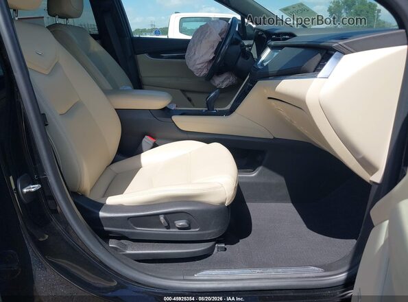 1GYKNARS7KZ116776 2019 CADILLAC XT5 Black წინა სალონის ხედი