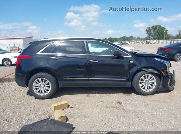 1GYKNARS7KZ116776 2019 CADILLAC XT5 Black უკანა სალონის ხედი