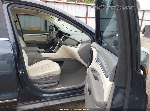 1GYKNDR40MZ150239 2021 CADILLAC XT5 Blue Սալոնի դիմացի տեսք