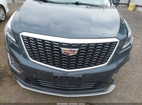 1GYKNDR40MZ150239 2021 CADILLAC XT5 Blue Սալոնի հետևի տեսք