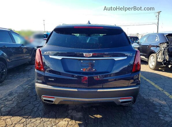 1GYKNDR40RZ759080 2024 CADILLAC XT5 Purple Rear view