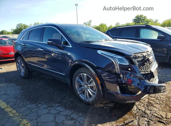 1GYKNDR40RZ759080 2024 CADILLAC XT5 Purple Front right