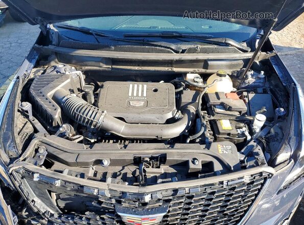 1GYKNDR40RZ759080 2024 CADILLAC XT5 Purple Engine compartment view